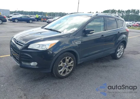 2014 Ford Escape Titanium z USA, uszkodzony, nr VIN 1FMCU9JX3EUD12892